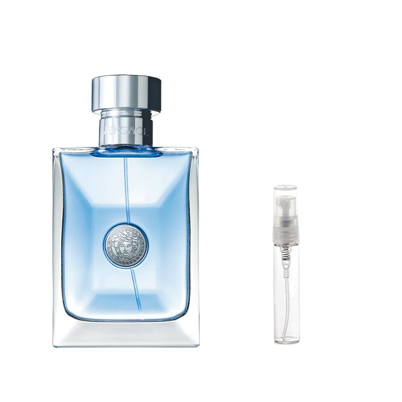 Blue glass perfume bottle with silver cap, shown with clear spray vial