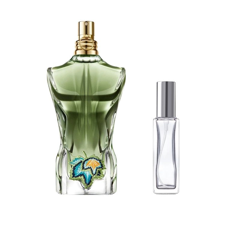 Green perfume bottle sample with gold cap and clear slender spray bottle with silver cap