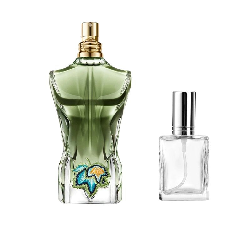 Green perfume bottle sample with gold cap and clear square spray bottle with silver top