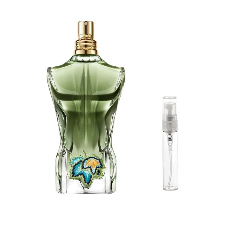 Green perfume bottle sample with gold cap and clear travel spray vial