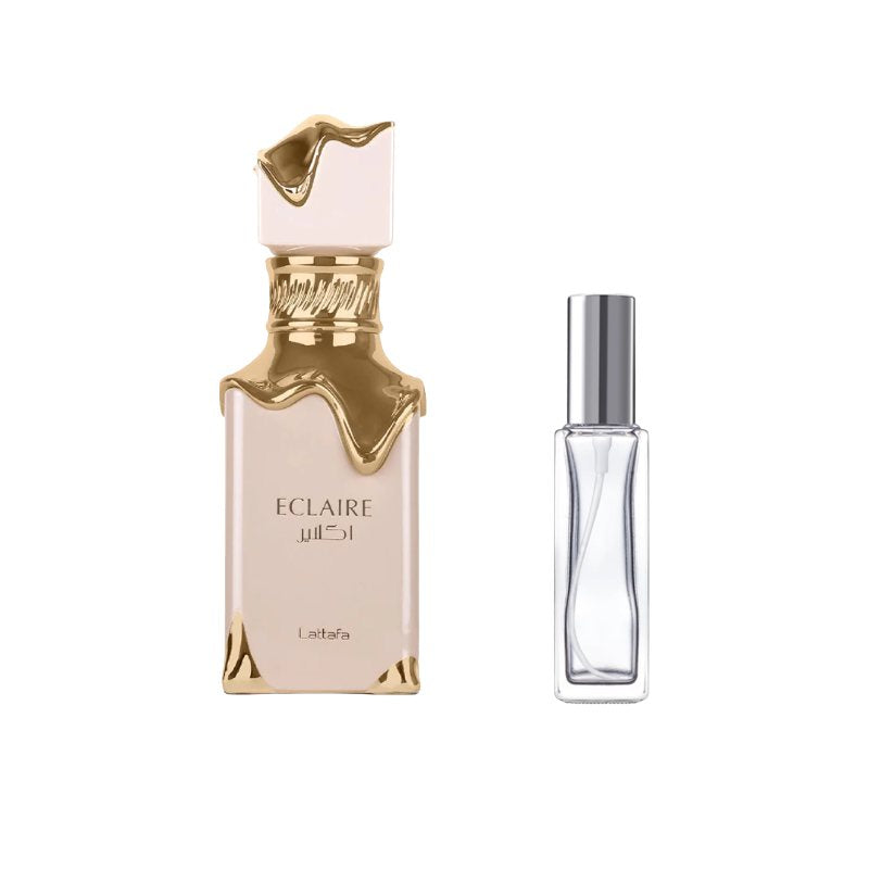 Perfume sample bottle with gold cap and clear atomizer spray bottle