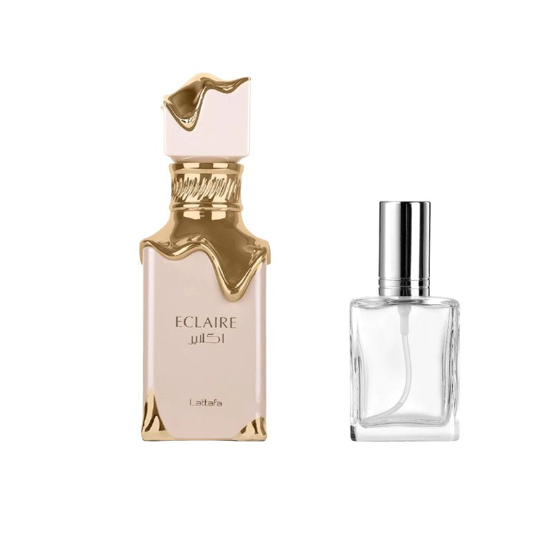 Perfume sample bottle with gold collar and matching clear atomizer spray bottle