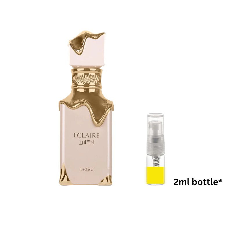 Perfume sample bottle with gold cap and pale blush glass body