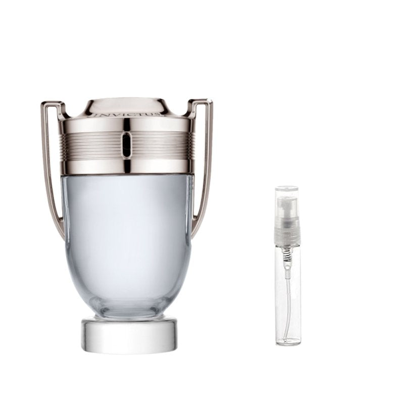 Silver-toned sample perfume vial with clear travel spray vial