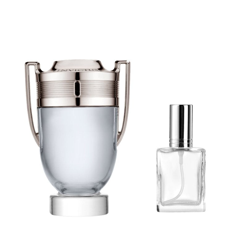 Silver-toned sample perfume vial with clear square glass perfume bottle