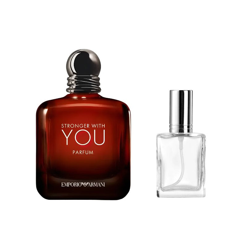 Amber-brown perfume bottle with black cap beside clear 15 ml square spray bottle