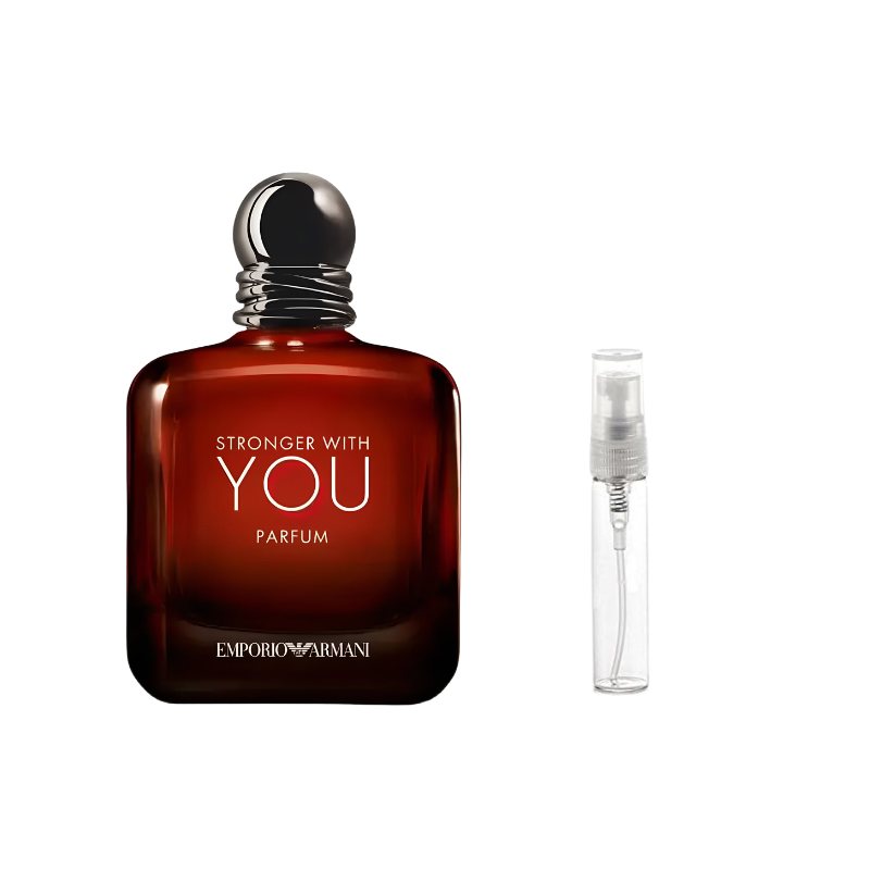 Amber-brown perfume bottle with black cap beside clear spray sample vial