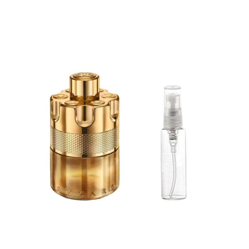 Gold perfume sample bottle with textured band and separate 2ml spray vial