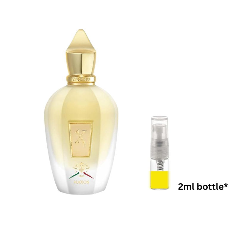 Eau de parfum bottle with gold cap plus 2 ml spray vial with yellow label