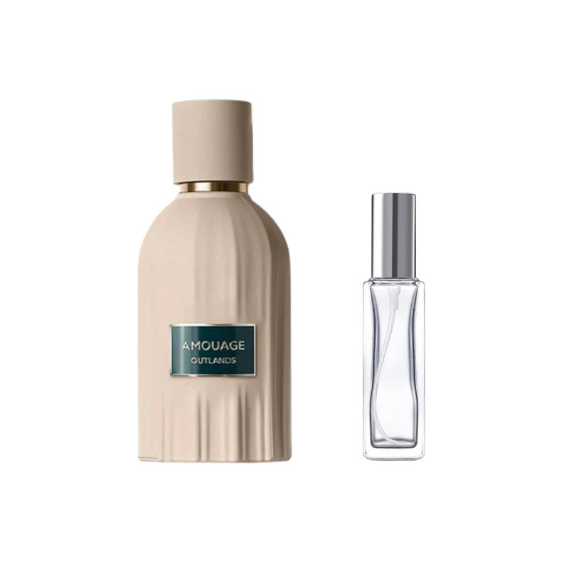 Perfume sample bottle with gold-toned cap and blue label with clear bottle and silver cap
