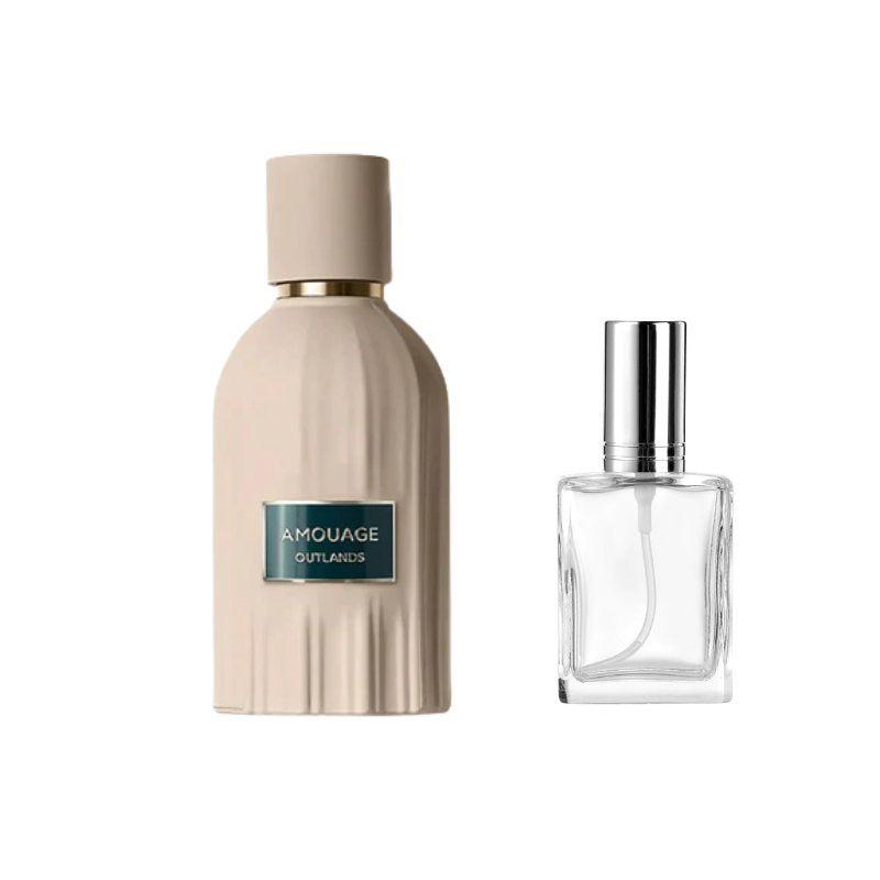 Perfume sample bottle with gold-toned cap and blue label with clear bottle and black cap