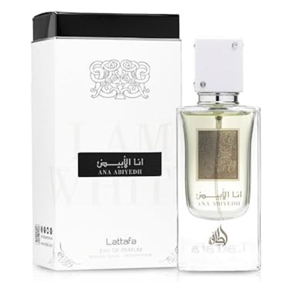 Perfume bottle and matching box, clear glass with ornate label, black cap