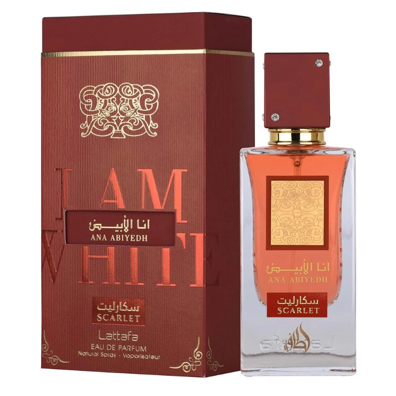 Scarlet perfume bottle with gold cap, amber liquid, and maroon gift box with gold logo